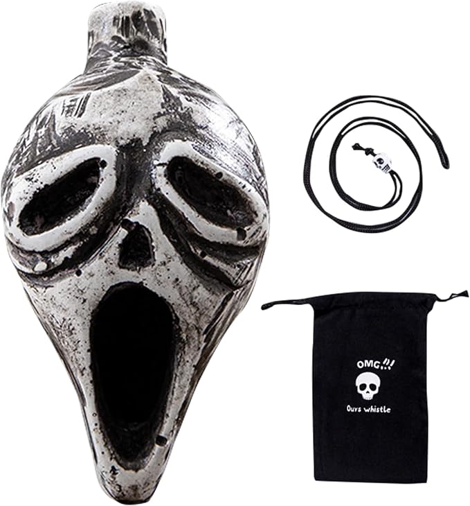 Silver skull-shaped whistle with cord and black pouch