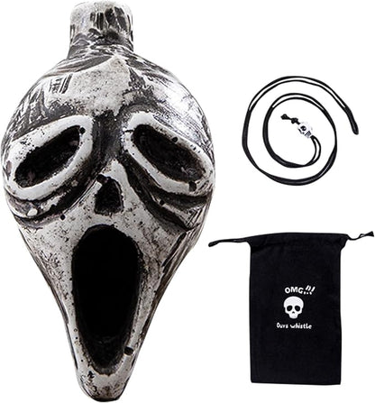 Silver skull-shaped whistle with cord and black pouch