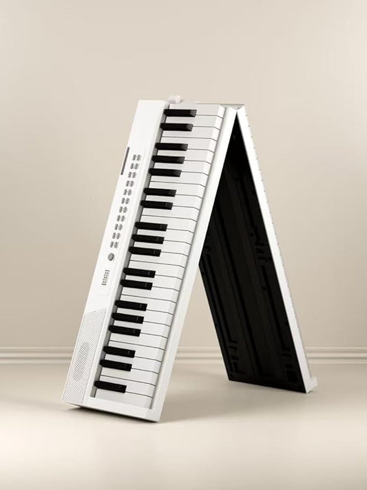 White folding piano keyboard standing in an A-frame position